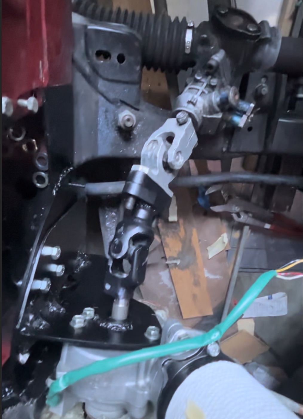Custom double U-joint steering linkage installed in the E30